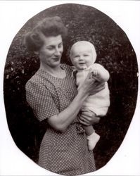 Nadine Boyer Crawford holding a baby, Petaluma, California, about 1938