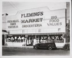 Staff of Flemings Market outside the store