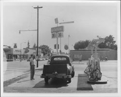 Wilshire Service Station with view of south side of 4th St. west of the station, Santa Rosa, California, 1962