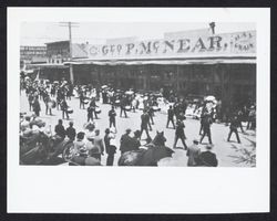 Unidentified band marching in a Petaluma parade on Main Street