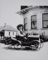 William Arden Akers drives his toy automobile on Bassett Street in Petaluma, California, about 1920