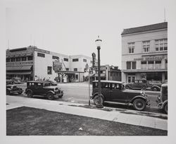 Mendocino Avenue, Santa Rosa, California, in 1936, showing Montgomery Ward, Bob's Service Station, Hancock Storage, E. H. Lamb, Lloyd's Cafe and the Press Democrat Building