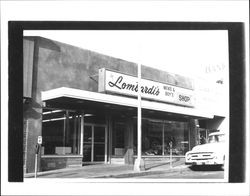 Lombardi's Men & Boy's Shop and office of Dr. George Meader, optometrist, Petaluma, California, about 1977