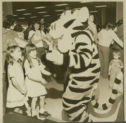 Tigger greeting children at Sears opening celebration, Santa Rosa, California, 1980