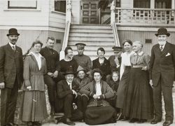 Raymond family standing in front of 314 Seventh Street, Petaluma, California, Christmas 1918