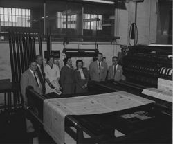 Dignitaries observing the printing of the Petaluma Argus-Courier, Petaluma, California, 1955