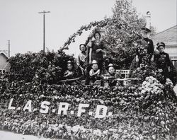 Ladies' Auxiliary of the Santa Rosa Fire Department float in a Santa Rosa parade, Santa Rosa, California, 1930s