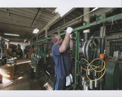 Russell Strickland working on a machine bar, Sunset Line & Twine Company in Petaluma, California, Dec. 5, 2006