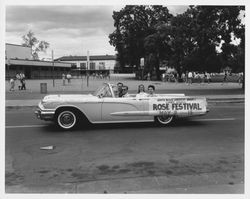 Santa Rosa's Greatest Event--Luther Burbank Rose Festival, May 9 thru 15, sponsored by Santa Rosa Jaycees; signs on a Ford Thunderbird