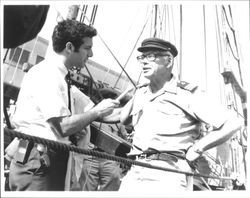 Karl Kortum being interviewed aboard a ship, San Francisco, California(?), about 1960