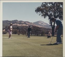 Playing golf at Bennett Valley Golf Course, Santa Rosa, California, 1970