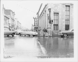 Intersection of Main and Western during a rain storm, Petaluma, California, 1954