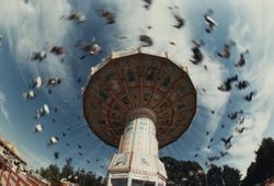 Carnival goers fly through the sky at the Sonoma County Fair, Santa Rosa, California