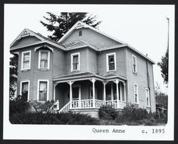 Two story Queen Anne home with narrow flashboard siding