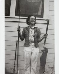 Georgina M. Evans with her catch and fishing pole, Marshall, California,1940s