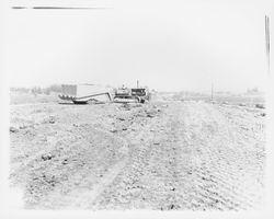 Earth moving equipment at work on Highway 101, Petaluma, California, 1955