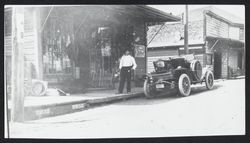 John Thomas Coon in front of his hardware store, Guerneville