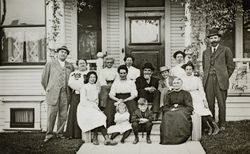 Raymond family posing on the front steps of 245 Keokuk Street, Petaluma, California, about 1911