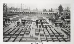 View of the Library's main floor foundation construction looking west