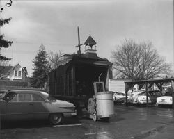 Unloading rolls of newsprint at the Petaluma Argus-Courier, Petaluma, California, about 1955