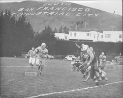 Leghorns play a rare game away with South San Francisco Windbreakers., South San Francisco, California, Nov. 18, 1951