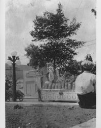 Floats being driven down East Washington Street near the intersection of Copeland Street, Petaluma, California, about 1920