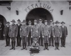 Boy Scout troop poses in front of the Petaluma Railroad Depot in Petaluma, California, photographed between 1925 and 1930