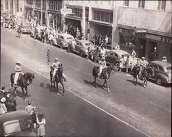 Color guard of the California Centaurs mounted junior drill team in the 1947 Rose Parade, Santa Rosa, California