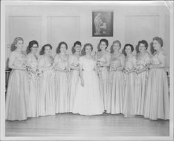 Group of women wearing formal gowns and carrying bouquets, Petaluma, California, about 1955