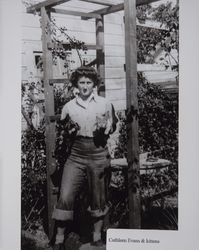 Cathleen Jane Evans with kittens in Petaluma, California, 1940s