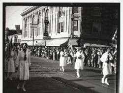 Marching units of women and girls in the Rose Parade