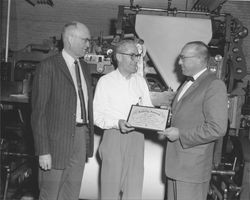 Duncan and Clay Olmsted receiving a safety award for the Petaluma Argus-Courier, Petaluma, California, 1959