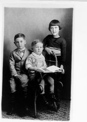 Portrait of three unidentified siblings