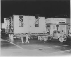 Church of One Tree being moved down Mendocino Avenue, Santa Rosa, California, 1957