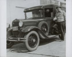 John F. Poulson stands by his panel truck, Walnut Park, Petaluma, California, July 1962