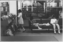 Patrons using the Dagny Juell Boys and Girls Room of the Library