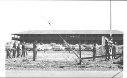 Raising the American flag at the Petaluma Adobe, Petaluma, California, about 1960