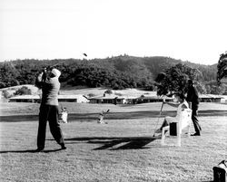 Playing golf at Oakmont Golf Course