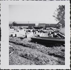 Construction crew building seven-sided block house at Fort Ross