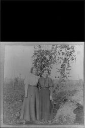 Elsie Bones Lapham and unidentified woman in a hop field