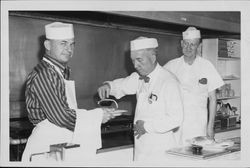 Rotarians flipping pancakes in Petaluma, California, about 1960