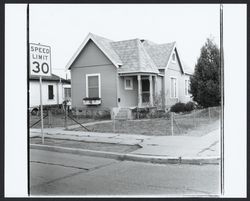 Small hip roof cottage on D Street