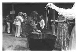 Making candles at the Old Adobe Fiesta, Petaluma, California, about 1973