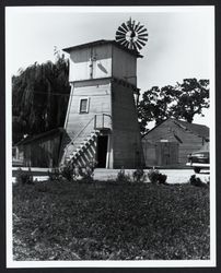 Tank house with windmill on an unidentified ranch, 1950s