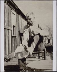 John G. Callison at his dairy, Mendocino Avenue, Santa Rosa, California, 1920s