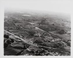 Aerial view of Redwood Highway, US Highway 101 under construction and the Santa Rosa Metropolitan Airport north of Santa Rosa, California, 1960