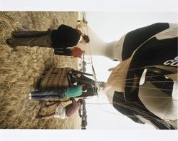 Al Bono, Chief Executive Officer of the California Cooperative Creamery, standing beneath a hot air balloon shaped like a cow--advertising California Gold Dairy Products--at the 1994 Sonoma County Hot Air Balloon Classic, July 1994