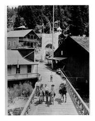 Children with ponies on Camp Meeker bridge