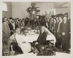 Borba family posing around the table prior to their meal