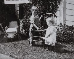 Bernard and Lillian Claire White play in the yard, Petaluma, about 1915